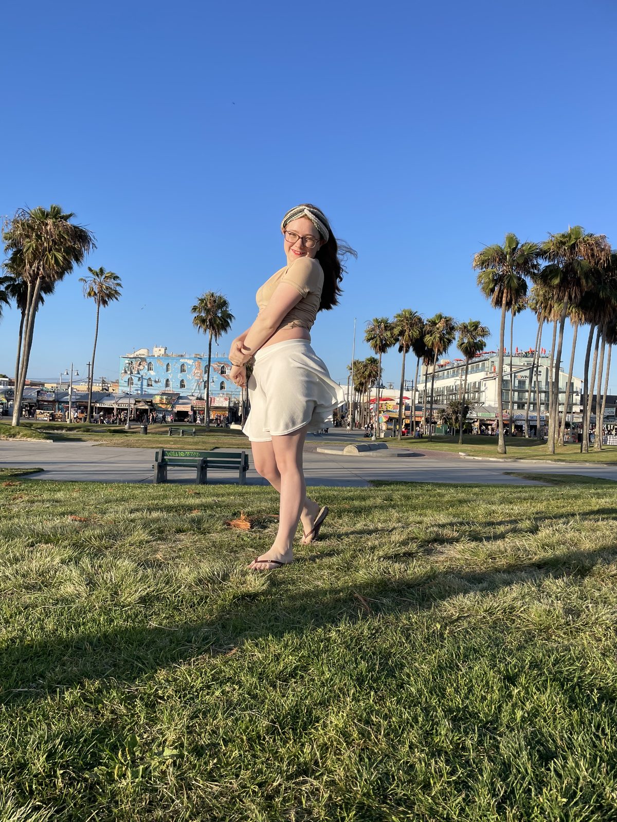 Andrea Estep at the end of Windward Avenue, Venice Beach, with the boardwalk behind her